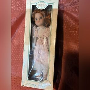 Studio Collection Porcelain Doll with Floral Accents